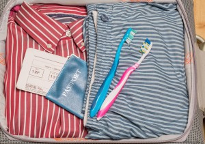 suitcase with toothbrush | fairfield dental arts