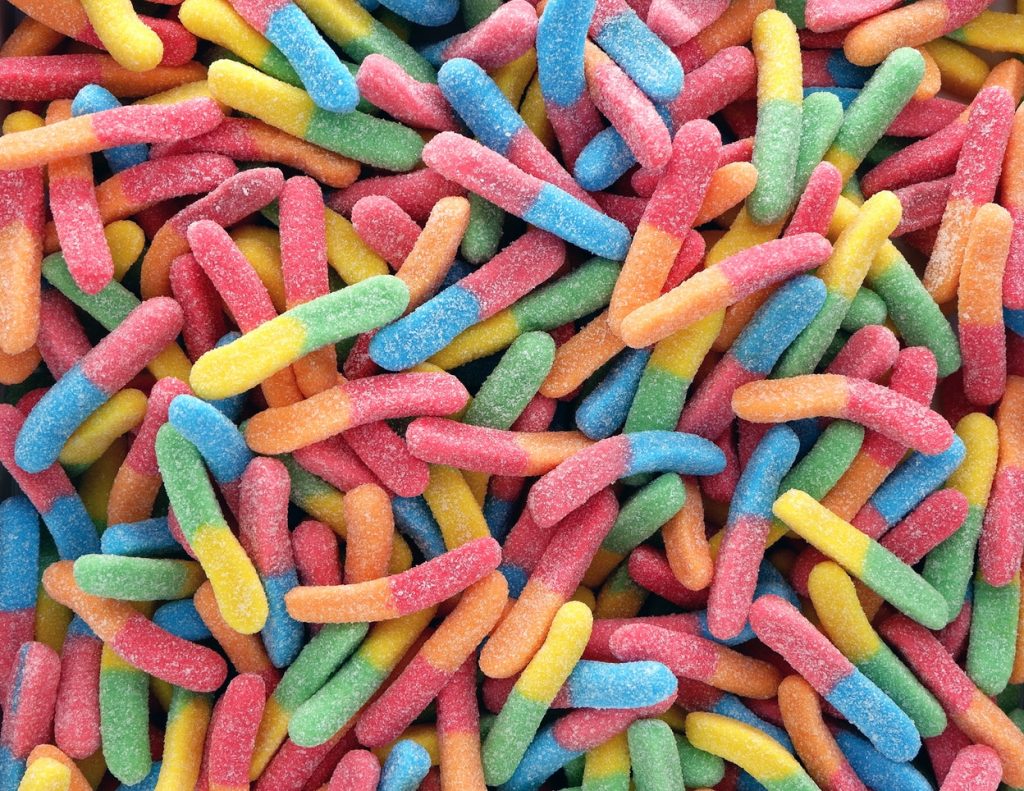 Pile of sugary sour gummy worms