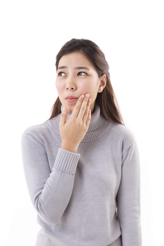 Woman feeling toothache
