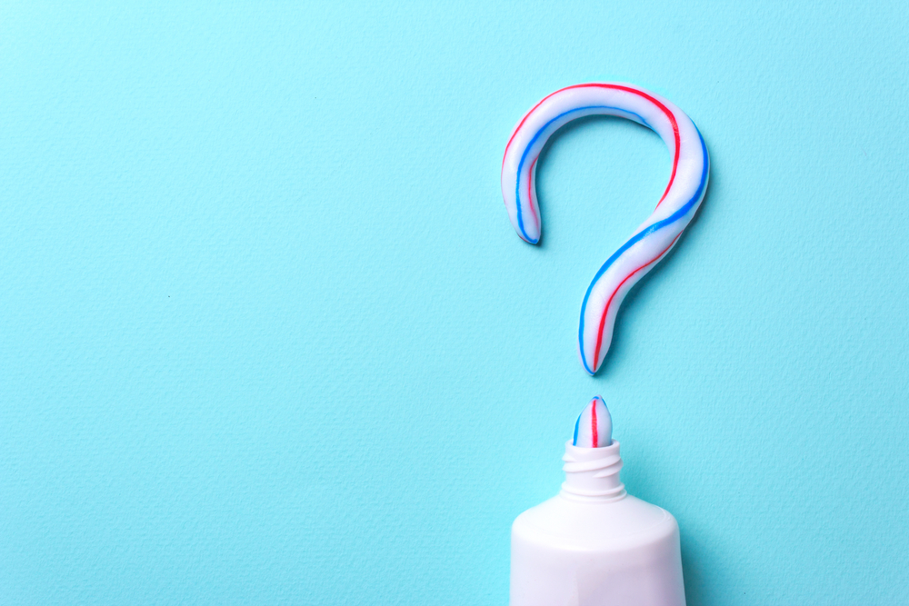 toothpaste in shape of question mark