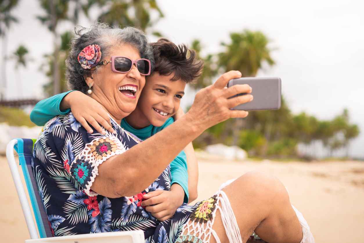 Senior Adult, Family, Grandmother, Women, Latin American and Hispanic Ethnicity; dental health on vacation