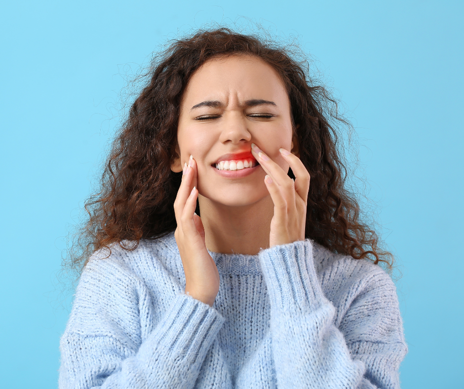 A woman with oral pain