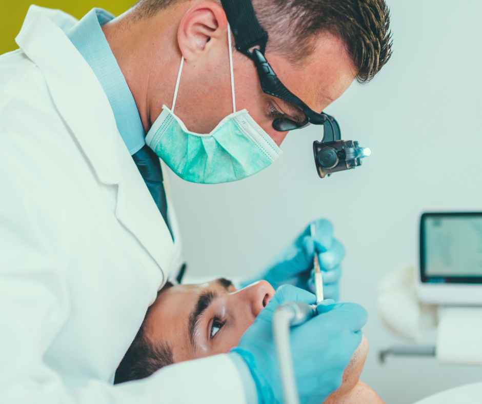 A dentist performing a root canal